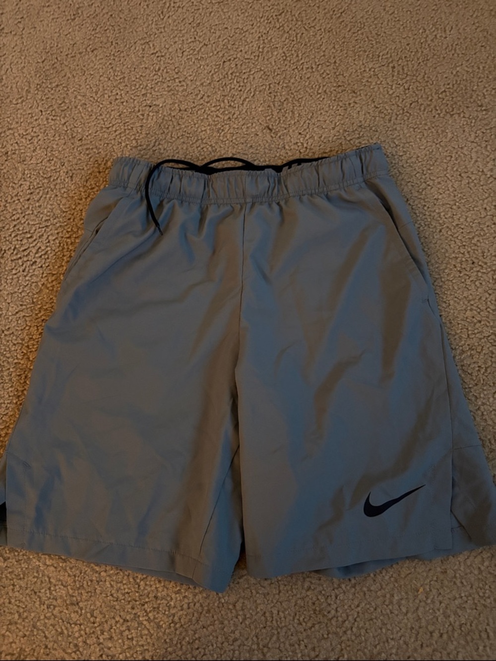 Nike Light Gray Athletic Shorts with Black Swoosh